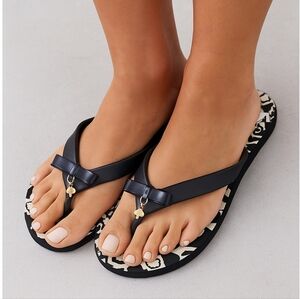 Kate Spade Women's Bow Floral Flip Flops with Gold Spade charm Sandals size 6.